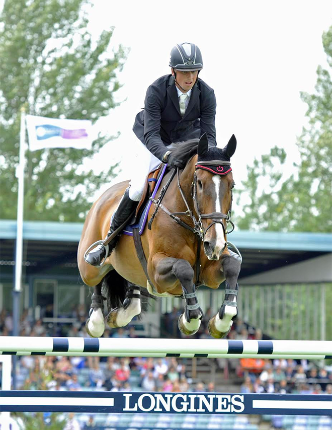 International showjumper Trevor Breen clearing a fence